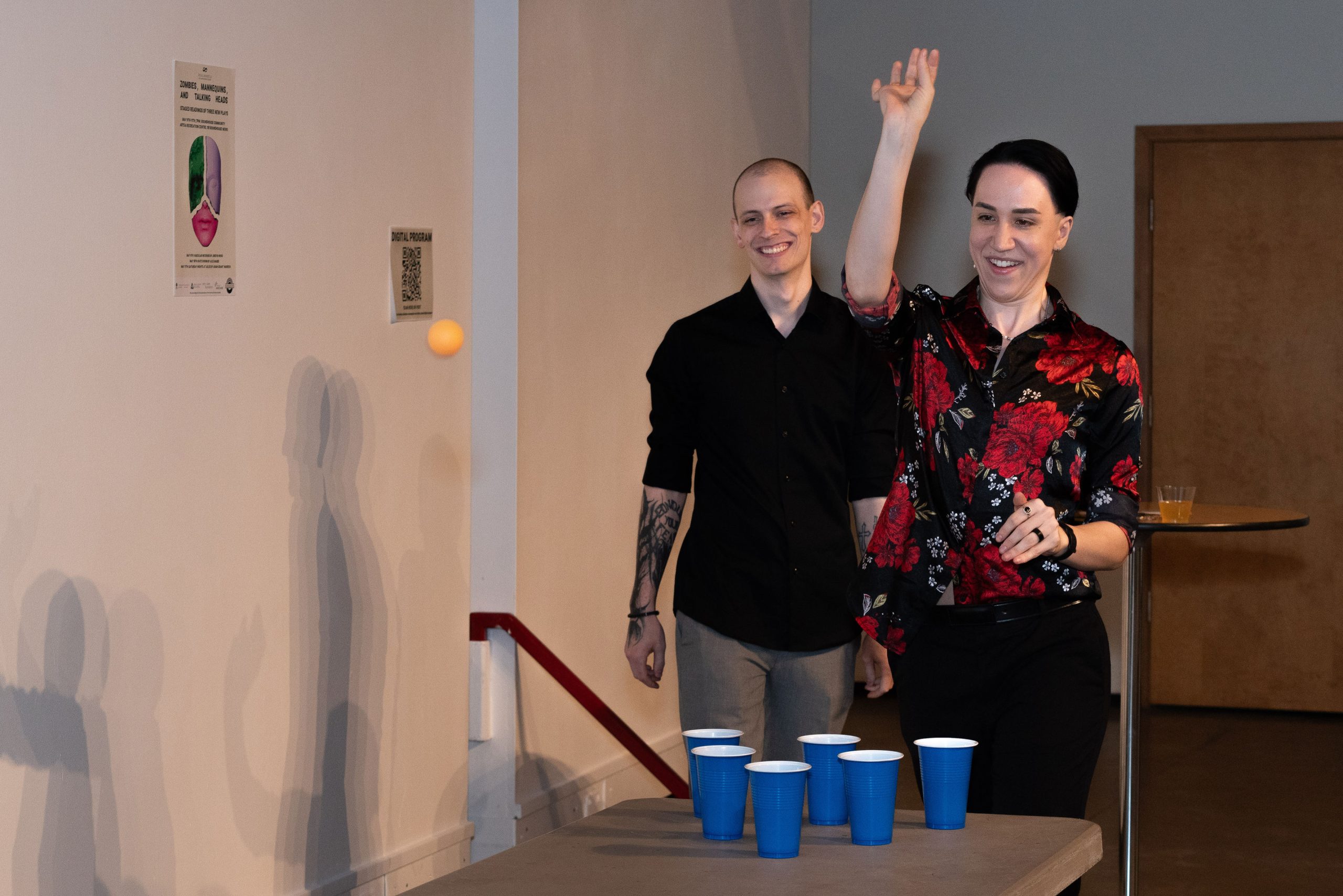 Photo from Gala Launch - Two attendees play beer pong.