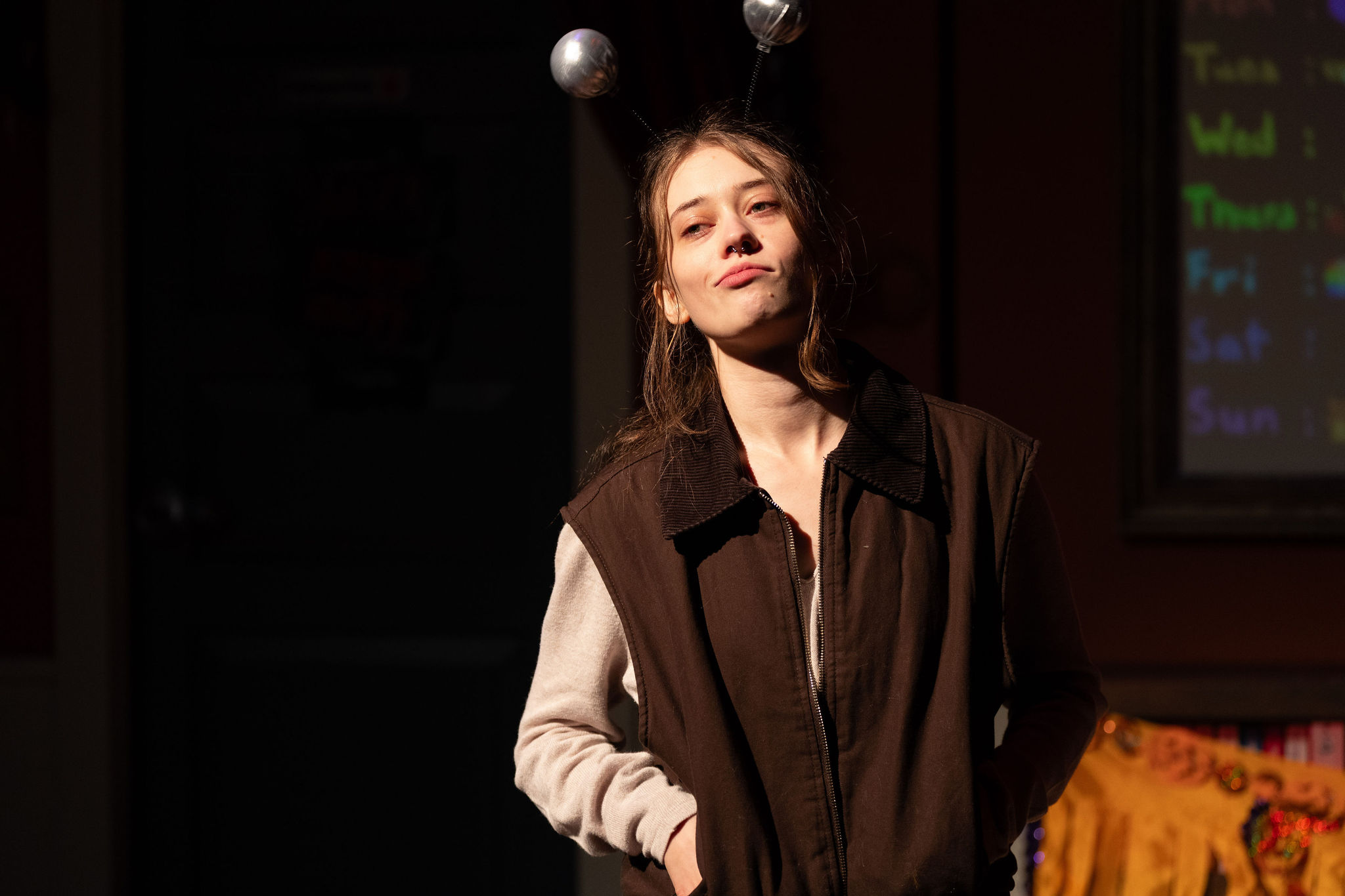 Production Photo of Faye's Room - An actor with an alien headband