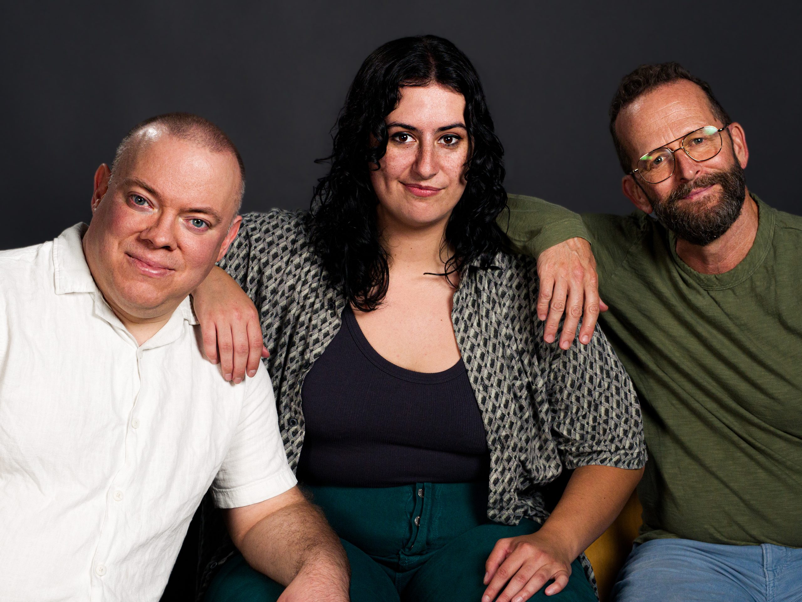 Studio portrait of Glitch staff - Adam, Jordyn, and Shawn.